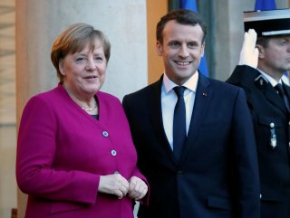 Merkel ve Macron SPD’ye koalisyon çağrısı yaptı