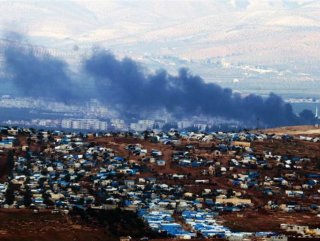 YPG’li teröristler Afrin’de lastik yakmaya başladı
