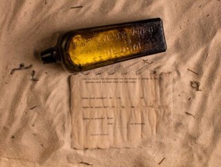 132 yıllık şişe mesajı sahile vurdu