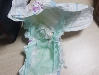 Bebeğin üzerindeki bezde eroin sakladılar