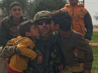 Children in Afrin cheer over Turkish soldiers