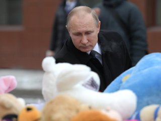 Putin AVM yangınında ölenleri andı
