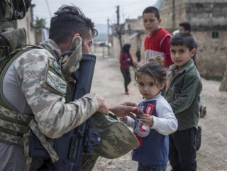 Turkish soldiers help Afrin residents out
